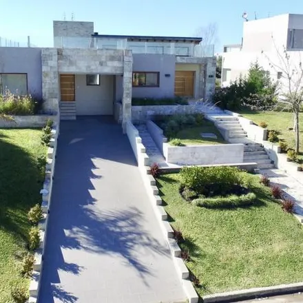 Buy this 4 bed house on unnamed road in Partido de Campana, Lomas del Río Luján