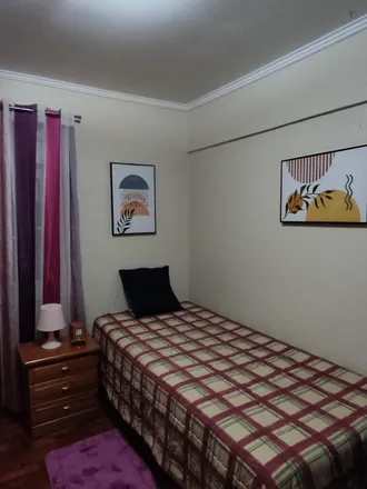 Rent this 3 bed room on Rua Cidade da Praia LT 364 in 1800-119 Lisbon, Portugal