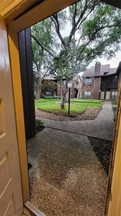 Rent this 2 bed condo on Library Loop Trail in Houston, TX 77042