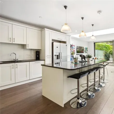 Rent this 5 bed duplex on Napier Avenue in London, SW6 3NP