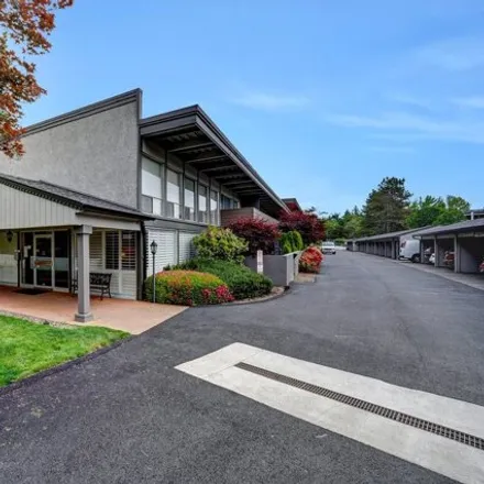 Buy this 2 bed condo on Raleigh Park Plaza in 4460 Southwest Scholls Ferry Road, Portland