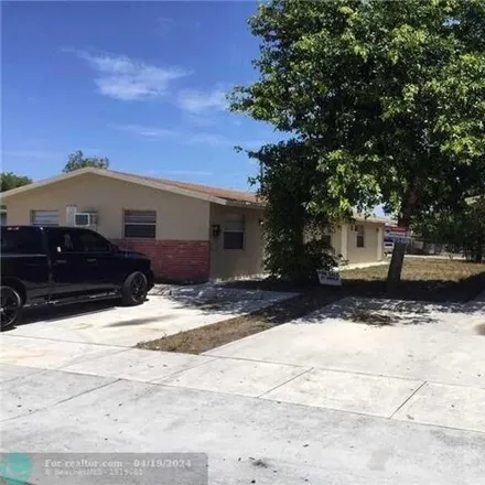 Buy this 5 bed house on 2766 Northwest 15th Court in Broward County, FL 33311