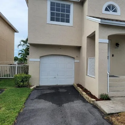 Rent this 3 bed house on 12019 Northwest 13th Street in Pembroke Pines, FL 33026