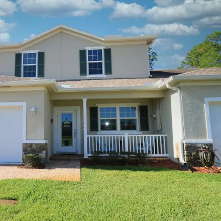 Buy this 3 bed townhouse on 983 Northeast Trailside Run in Port Saint Lucie, FL 34983