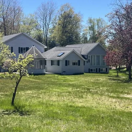 Buy this 7 bed house on 6752 Bar Lake Road in Manistee Township, MI 49660