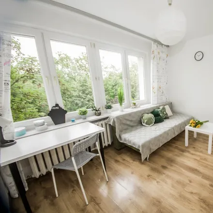 Rent this 4 bed room on Dobrego Pasterza 108 in 31-416 Krakow, Poland