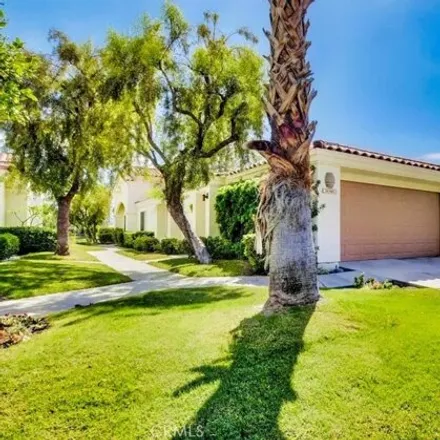 Buy this 3 bed condo on Arnold Palmer Golf Course (PGA West) in Canterbury, La Quinta