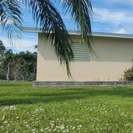 Buy this 2 bed house on 749 Northeast Cypress Street in Saint Lucie County, FL 34952