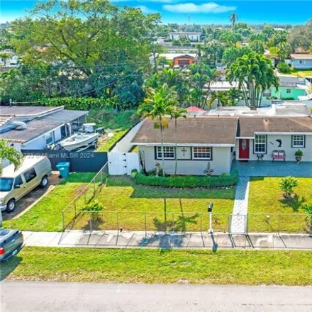 Buy this 4 bed house on 7884 Northwest 175th Street in Palm Springs North, Hialeah Gardens