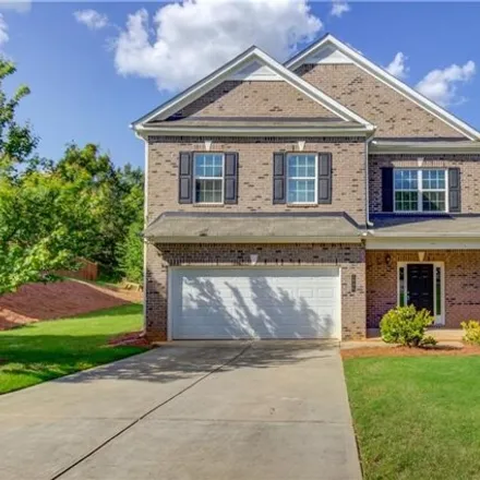 Buy this 4 bed house on 3996 Pine Village Pl in Loganville, Georgia