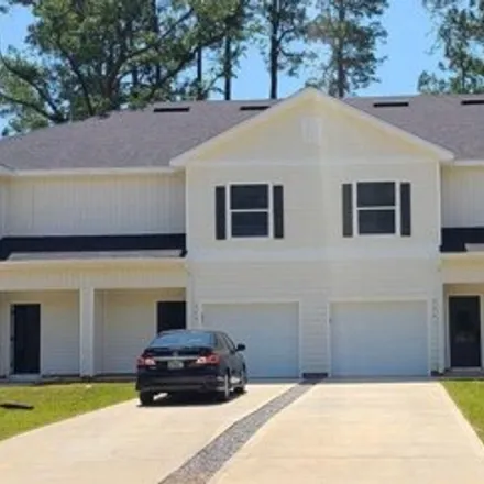 Rent this 3 bed townhouse on 406 Cloverdale Boulevard in Wright, Okaloosa County