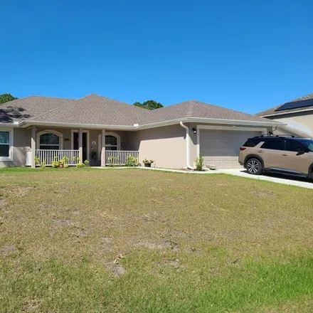 Buy this 3 bed house on 361 Galena Street Southwest in Palm Bay, FL 32908