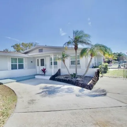Buy this 3 bed house on 5320 Quist Drive in Port Richey, FL 34668