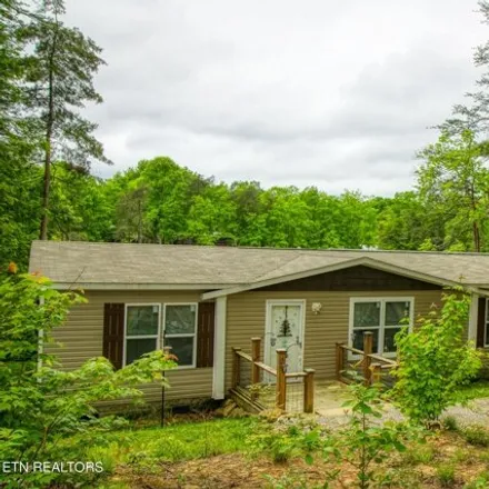 Buy this studio apartment on Boone Dock Lake Road in Fentress County, TN