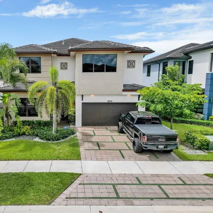 Rent this 5 bed house on 8824 Northwest 154th Terrace in Miami Lakes, FL 33018
