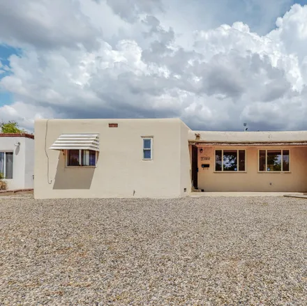 Buy this 4 bed house on 1810 Florida Street Northeast in Albuquerque, NM 87110