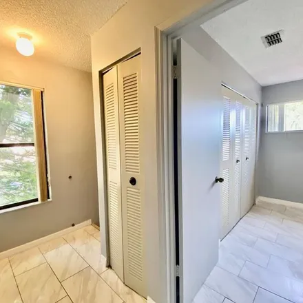 Rent this 2 bed townhouse on 4992 Eaglesmere Drive in Orlando, FL 32819