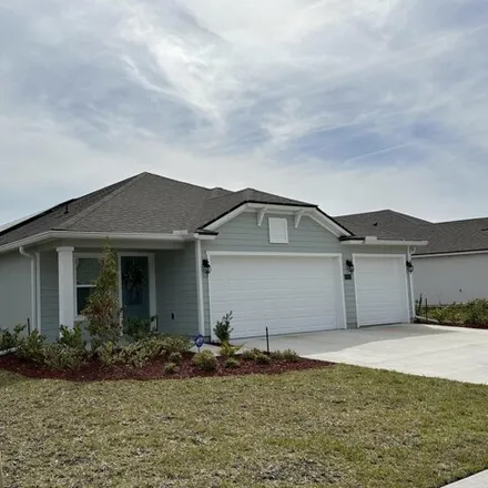 Rent this 4 bed house on Winding River Drive in Nassau County, FL