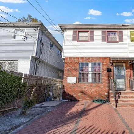 Buy this 3 bed house on 111-41 157th Street in New York, NY 11433