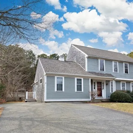 Buy this 4 bed house on 16 Quashnet Woods Dr in Mashpee, Massachusetts