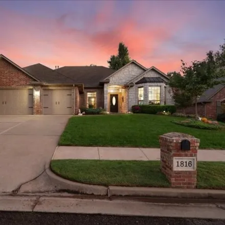 Buy this 4 bed house on 1906 Redland Drive in Edmond, OK 73003
