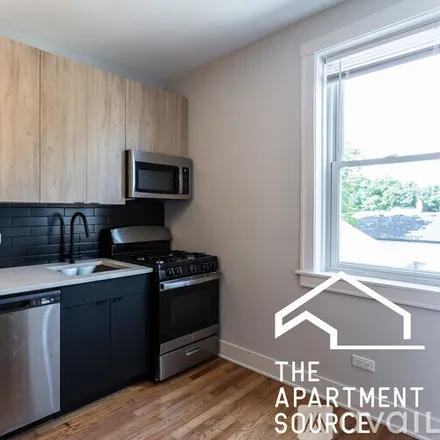 Rent this 1 bed apartment on 4009 N Lowell Ave