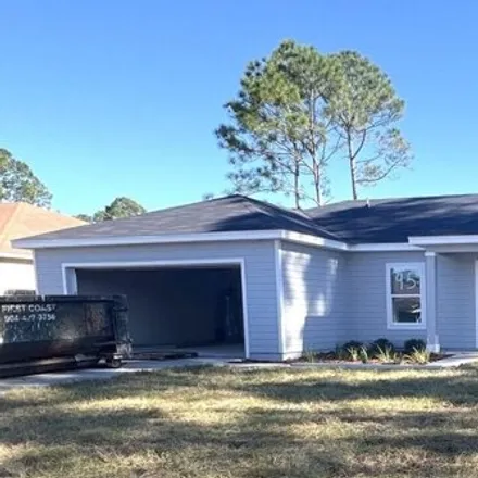 Buy this 4 bed house on 93 Rickenbacker Drive in Palm Coast, FL 32164
