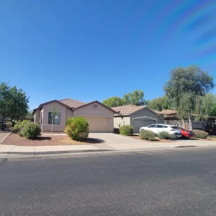 Rent this 4 bed house on 16965 West Lundberg Street in Surprise, AZ 85388