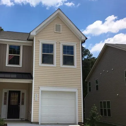 Rent this 3 bed house on 1368 Garden Stone Drive in Raleigh, NC 27610