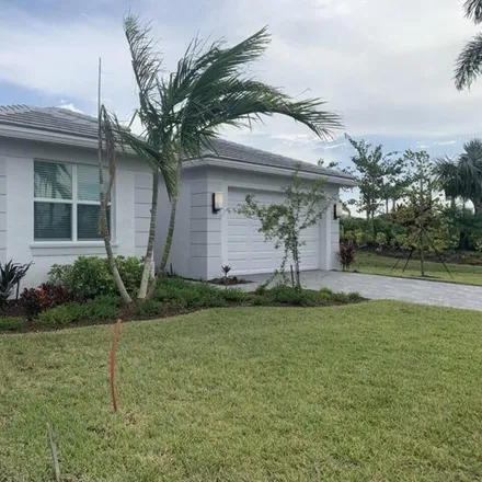 Rent this 3 bed house on Southwest Poseidon Way in Port Saint Lucie, FL 34987