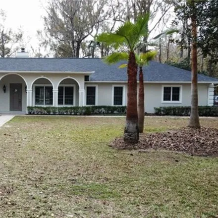 Buy this 4 bed house on 6930 Southeast 12th Circle in Marion County, FL 34480