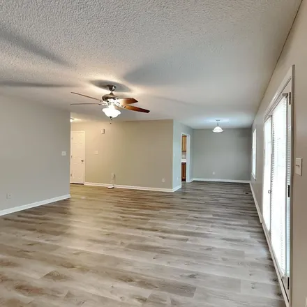 Rent this 3 bed apartment on 1209 Woodbriar Street in Brigadoon, Clayton