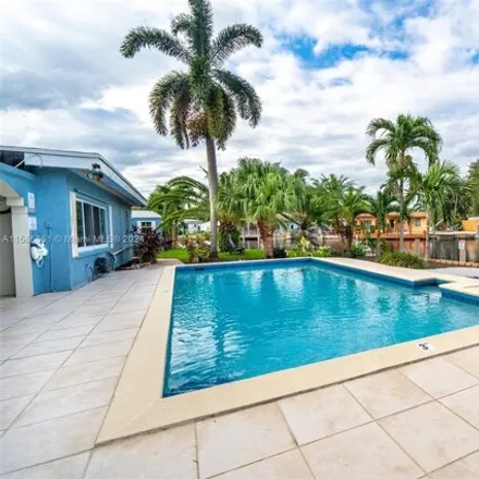 Rent this 4 bed house on 2701 Coolidge Street in Hollywood, FL 33020