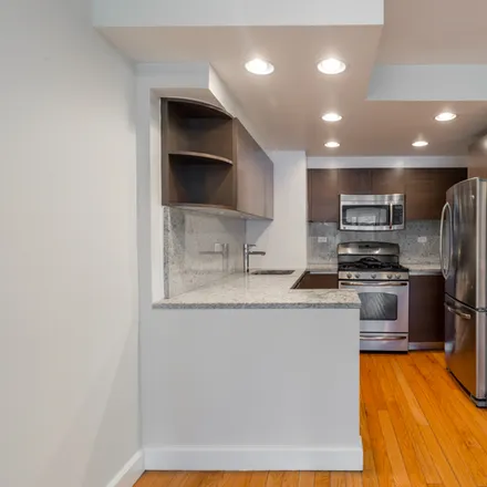 Rent this 2 bed apartment on 347 E 65th St