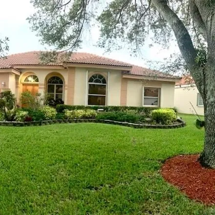 Buy this 4 bed house on 10262 Northwest 54th Place in Brookside North, Coral Springs