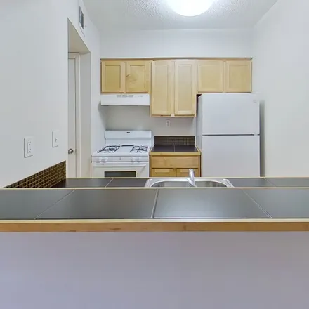 Rent this 2 bed apartment on 2207 Lawnmont Avenue in Austin, TX 78756