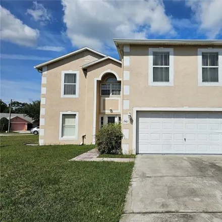 Rent this 4 bed house on 653 Koala Court in Polk County, FL 34759