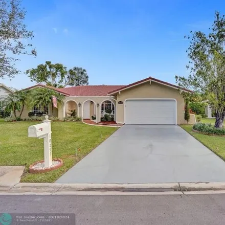 Buy this 3 bed house on 10299 Northwest 16th Court in Coral Springs, FL 33071