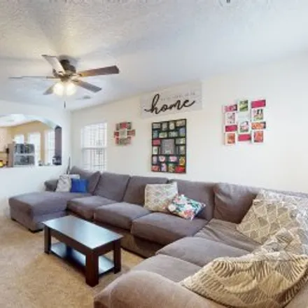 Buy this 4 bed apartment on 7104 Paese Place Northwest in Northwest Albuquerque, Albuquerque