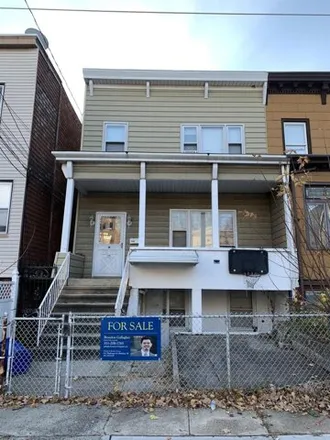 Buy this 5 bed house on 35 Pearsall Avenue in Jersey City, NJ 07305