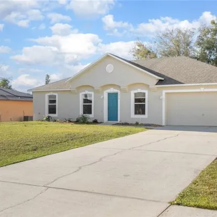 Buy this 3 bed house on 1936 South Old Mill Drive in Deltona, FL 32725