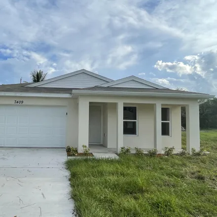 Image 1 - 7399 Belleair Avenue, Lakewood Park, FL 34951, USA - House for rent