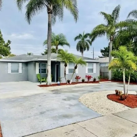 Buy this 3 bed house on Pine Grove Elementary School in 400 Southwest 10th Street, Delray Beach