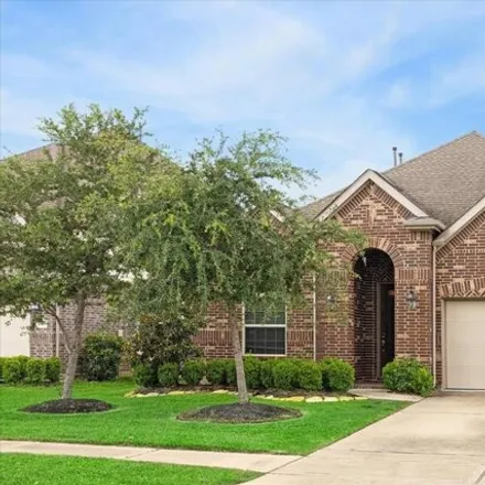 Rent this 4 bed house on 10821 Paula Bluff Lane in Cypress Creek Lakes, TX 77433