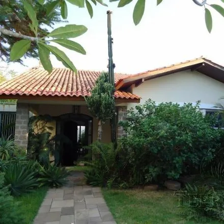 Buy this 4 bed house on Rua Jacipuia in Guarujá, Porto Alegre - RS