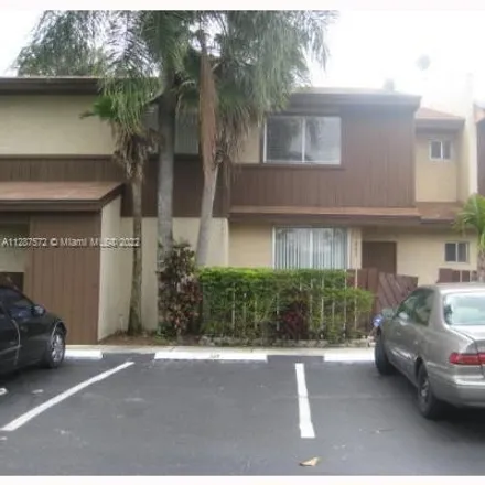 Rent this 2 bed townhouse on 1241 Hampton Boulevard in North Lauderdale, FL 33068