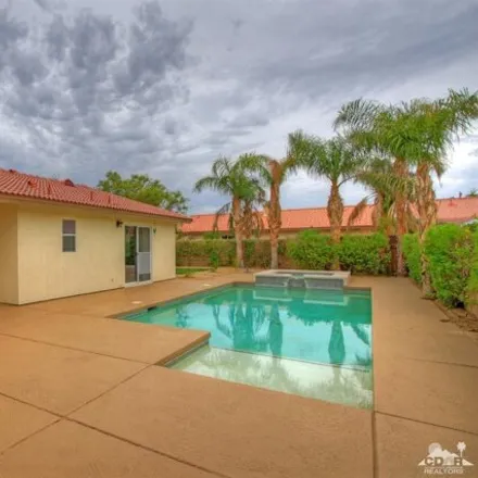 Rent this 4 bed house on Reclinata Way in Indio, CA 92203