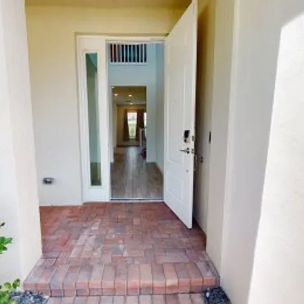 Buy this 4 bed apartment on 3235 Dunning Drive in Saratoga at Royal Palm, Royal Palm Beach