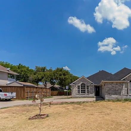 Buy this 4 bed house on 1354 Ashbrook Drive in Grand Prairie, TX 75052