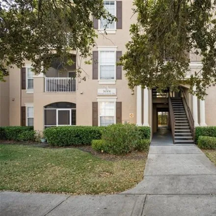 Buy this 2 bed condo on Cypress Crossing Drive in Hunters Creek, FL 32837